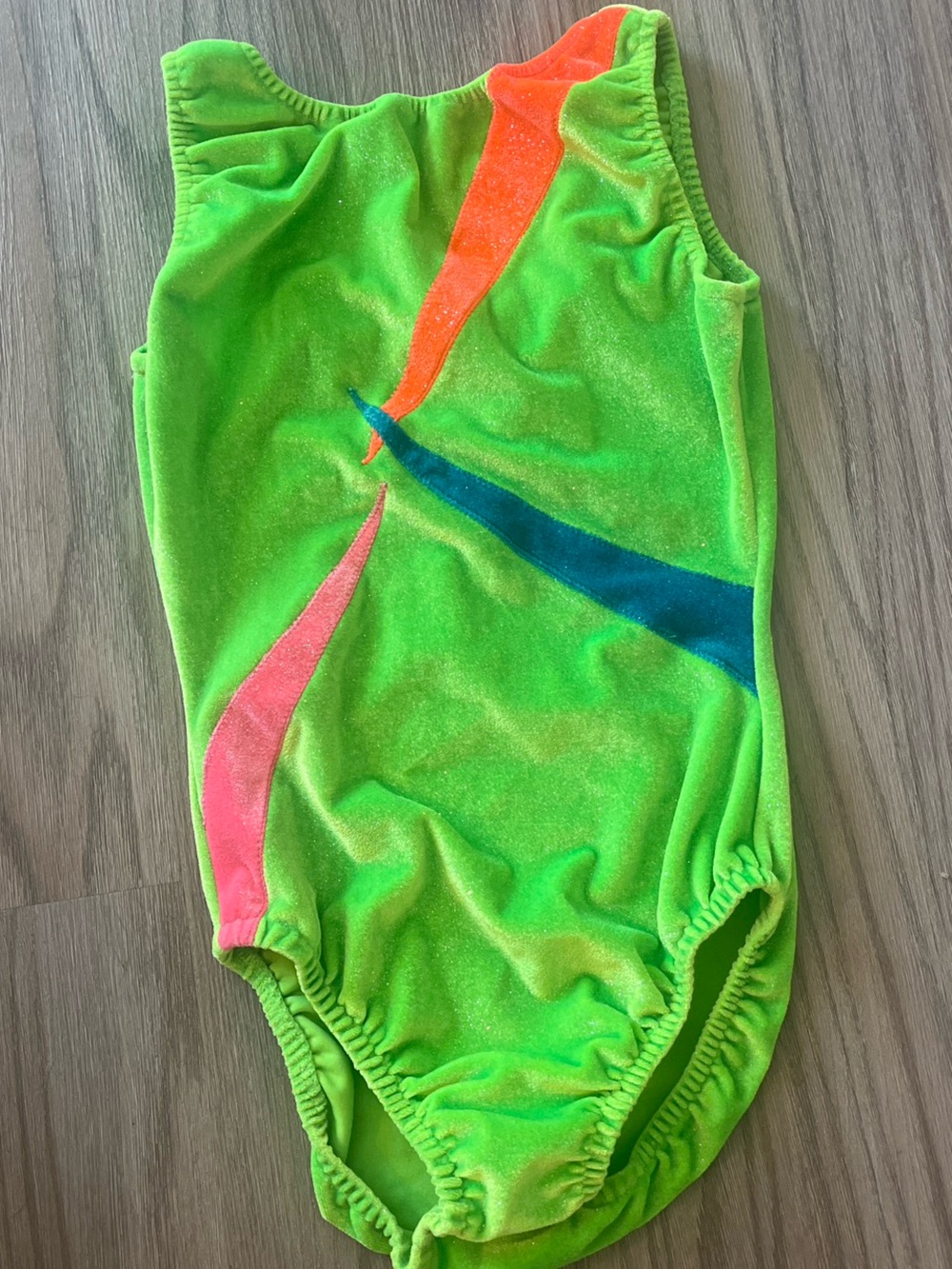 Green Elite gymnastics leotard AXS with Bright Accent Colors